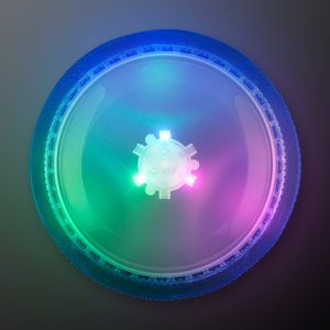A colorful light up frisbee with a snowflake design.